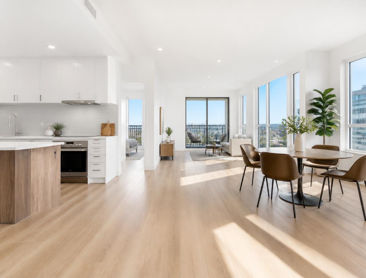 Bright, freshly cleaned modern apartment with open kitchen and dining area